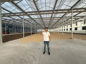 Multi-wall polycarbonate greenhouse maximizing thermal gain for energy-efficient solar drying.